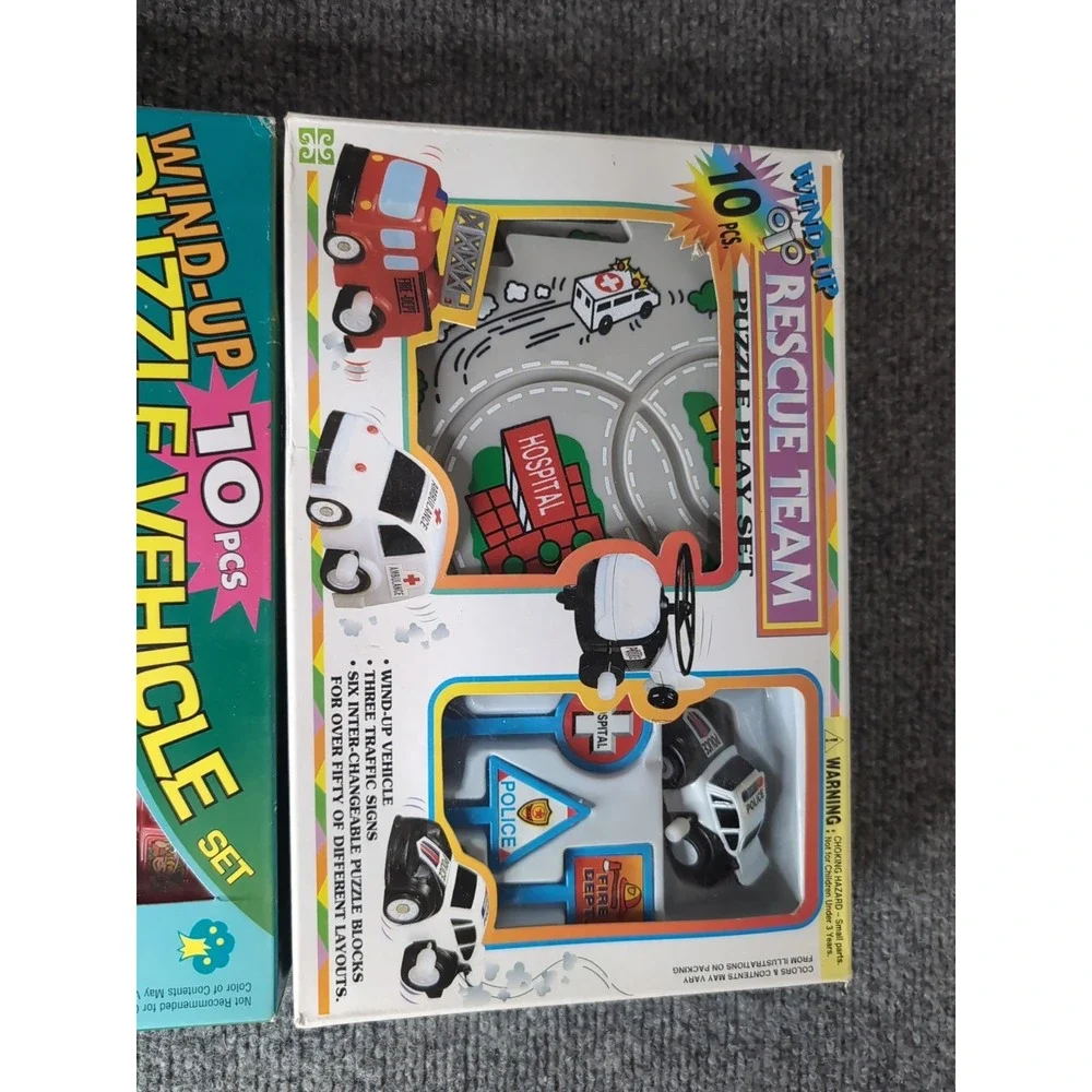 2 - Vintage Wind Up Puzzle Vehicle Sets Rescue Team & Train NEW 1990's‎ Ages 4+